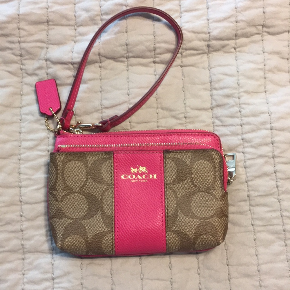 Coach tan and hot pink wristlet. used once.